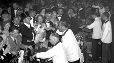 General scene of drinking in cocktail bar during first act intermission at the Metropolitan Opera House